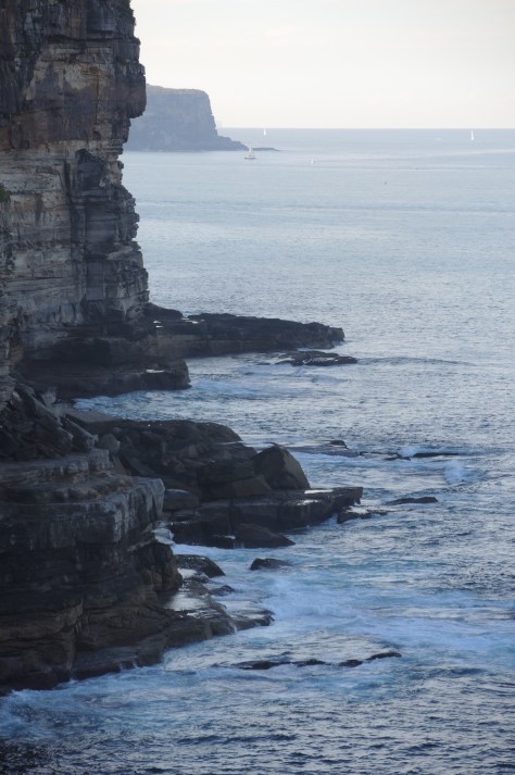 The far cliff face marks the northern edge of the entrance to Sydney Harbor, the near cliffs mark the southern edge, and the wide area between is a beautiful, safe entry to the natural wonder.