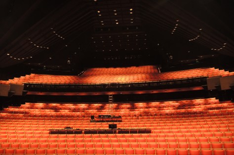 With 1500 seats the Joan Sutherland theater is home to the Opera and Ballet. The ceiling lacks any decoration, which is not the case next door in the other large hall that hosts the symphony with a decorative ceiling. What is common to both showcases and another theater we attended in Australia? The lack of a center aisle! Some rows stretch to 51 seats wide, but the only ingress is from the sides, shuffling past 25 patrons to find your coveted center seat.